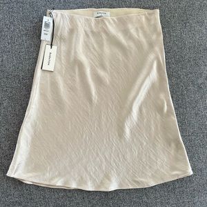 No tags Aritzia Babaton Mini Slip Skirt in “Denude” Nude - Size 8 / Medium